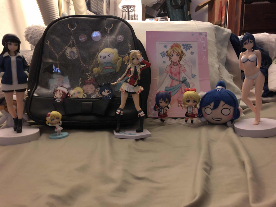 This is all my merch that I can show in 1 image! Includes my  almost  Eli ita bag, some figures and...